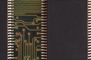 Close up of colored micro circuit board. Abstract technology background photo