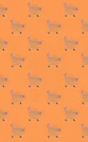 Shopping addiction, shopping lover or shopaholic concept. Many small empty shopping carts perform a pattern on a pastel colored paper background. Flat lay composition, top view photo