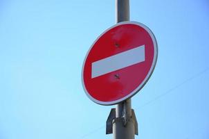 Road sign in the form of a white rectangle in a red circle. No entry photo