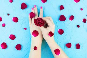 beauty hands with makeup flowers photo