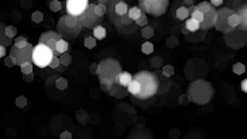 boucle floue paillettes hexagone bokeh particules tombant video