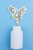 pills on a blue background photo