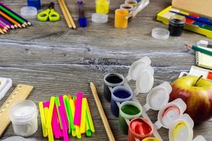 School supplies on a grey background photo