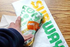 WASHINGTON, United States - March 20 2022  Subway Sandwiches at Subway Sandwiches Subway is a very popular fast food restaurant franchise in the United States. photo