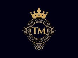 Letter TM Antique royal luxury victorian logo with ornamental frame. vector