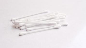 cotton buds, ears placed on a white background. photo