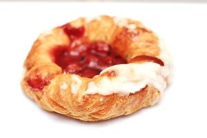 Cherry filled Danish or Danish bread placed on a white background. photo