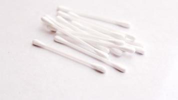 cotton buds, ears placed on a white background. photo