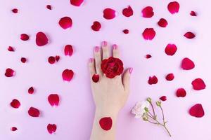 beauty hands with makeup flowers photo