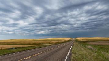 Highway and Wheat Fields in North Dakota photo