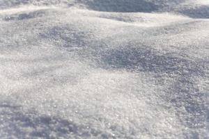 winter path in deep snowdrifts in twilight photo