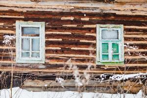 old timbered wall of rustic house photo