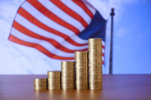 Golden coin stacks arranged as a graph. Increasing columns of coins photo