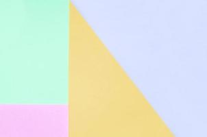 Texture background of fashion pastel colors. Pink, violet, orange and blue geometric pattern papers. photo