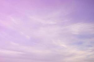 A photo of a bright and shiny blue sky with fluffy and dense whi