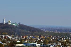 POLTAVA. UKRAINE - MAY 4, 2017 The Holy Cross Exaltation Monastery over the Poltava city photo