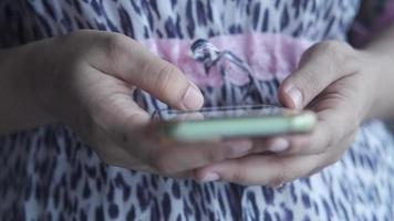 Woman with smartphone video