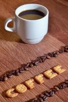 English word Coffee, made up of salt cracker letters photo