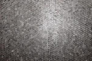 Pattern of 12 gauge cartridges for shotgun bullets. Shells for hunting rifle close up. Backdrop for shooting range or ammunition trade concepts photo