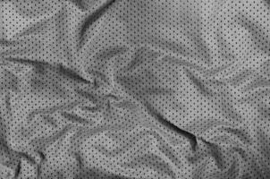 Sport clothing fabric texture background, top view of grey cloth textile surface photo