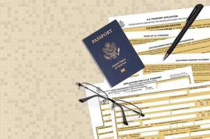 Department of State form DS11 Application for a U.S. Passport lies on table and ready to fill. Paperwork during operations with US Passport concept photo