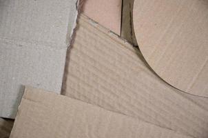 Background of paper textures piled ready to recycle. A pack of old office cardboard for recycling of waste paper. Pile of wastepaper photo