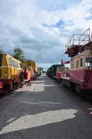 Cabs of modern Russian technical support electric trains and railway cranes. Side view of the heads of railway trains with a lot of wheels photo