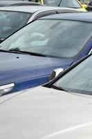 Roofs of several cars. A lot of cars stand close at rush hour photo