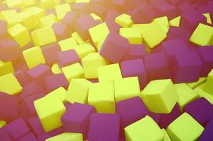 Many colorful soft blocks in a kids' ballpit at a playground photo