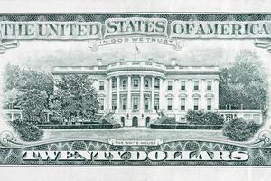 US 20 dollars banknote with white house closeup macro bill fragment photo