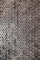Pattern of 12 gauge cartridges for shotgun bullets. Shells for hunting rifle close up. Backdrop for shooting range or ammunition trade concepts photo