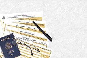 Department of State form DS11 Application for a U.S. Passport lies on table and ready to fill. Paperwork during operations with US Passport concept photo