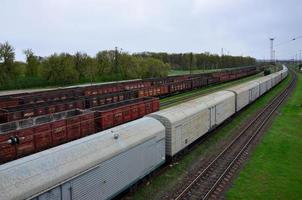 PAVLOGRAD. UKRAINE - MARCH 4, 2019 A huge number empty freight cars are in the Pavlograd railway de photo