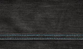 The texture of black denim cloth photo