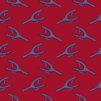 Purple slingshot , seamless pattern on a red background. vector