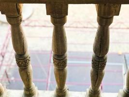 Beautiful wooden handrail palcon handmade. The background. Texture photo