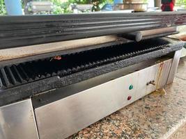 Grill for frying meat, fish, vegetables, electric grill for cooking healthy food without oil photo