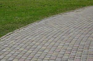 Background photo close-up of a large platform of paving stone in perspective