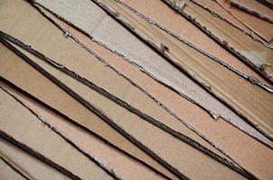 Background of paper textures piled ready to recycle. A pack of old office cardboard for recycling of waste paper. Pile of wastepaper photo