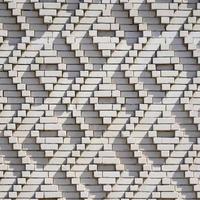 A pattern made of white bricks in the form of diamond shapes. Decoration of the walls during the Soviet Union photo