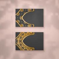 A presentable business card in black with a mandala in gold ornaments for your personality. vector