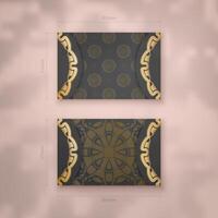 A presentable business card in black with an antique gold pattern for your contacts. vector