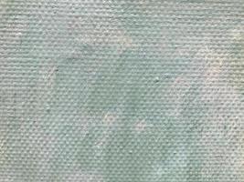 gray irregular texture. acryli paint on canvas. palette, paint stains. artists draft. a mixture of paints with water. paint strokes of dark colors in a circle, background. volumetric texture on canvas photo