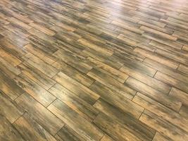 laminate in wood style. wooden boards, brown. wooden floor in the apartment, black and brown boards. cozy home improvement, apartment renovation