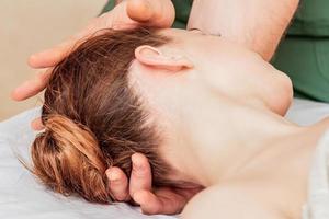 Head massage of woman. photo