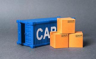 contenedor de carga azul con cajas. el concepto de comercio y comercio, entrega de carga, intercambio de bienes. globalización rendimiento de producción eficiente. comercio e industria, infraestructura de transporte. foto