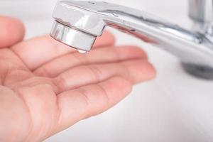 Close up of the hand washing the hand in the sink Health care concept. photo