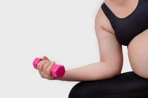 Fat people exercise by lifting dumbbells. On white background and isolated background. photo