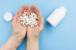 pills on a blue background photo