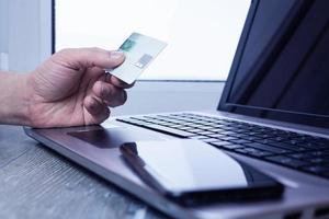 Bank card laptop businessman photo